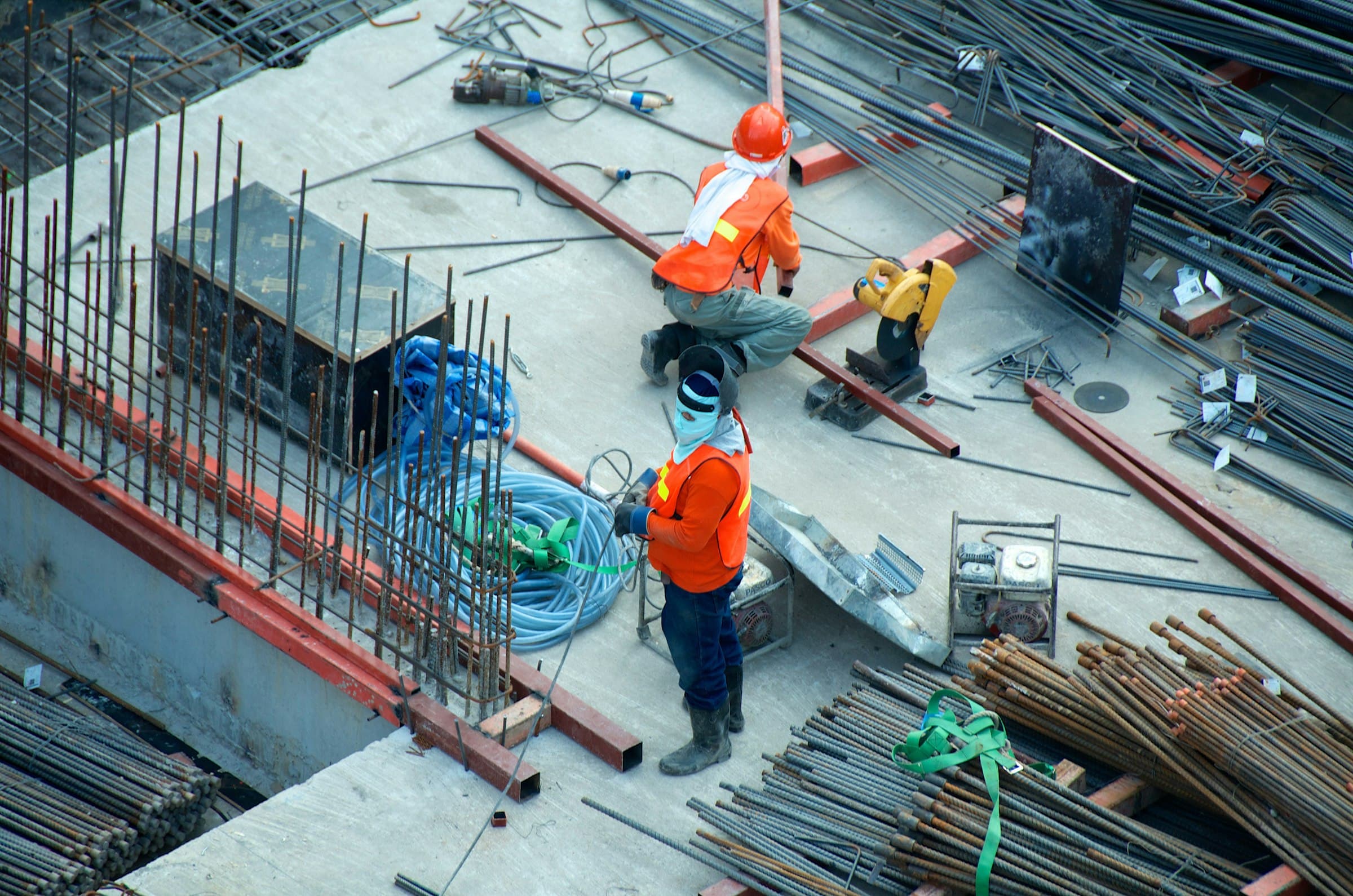 Construction crew framing a structure on a job site